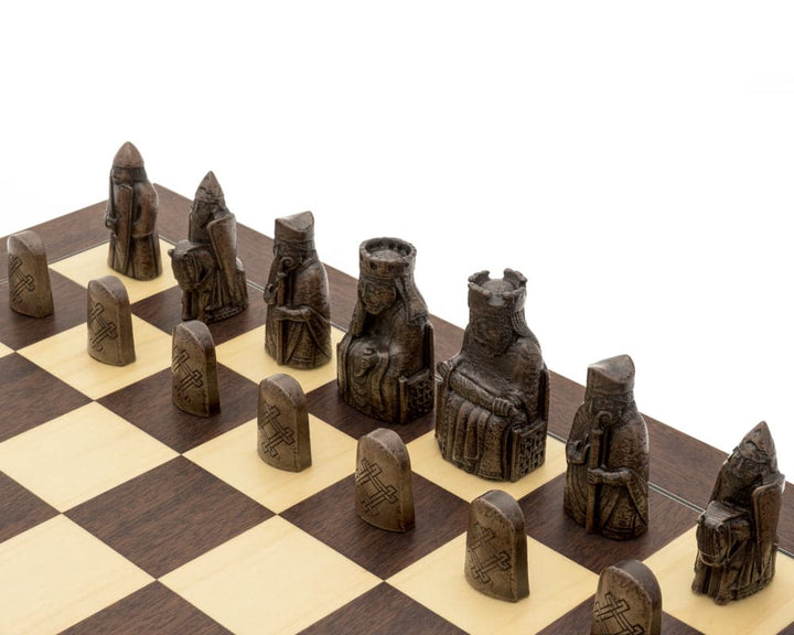 The Isle of Lewis Montgoy Palisander Grand Chess Set with detailed pieces on an imposing wooden board.