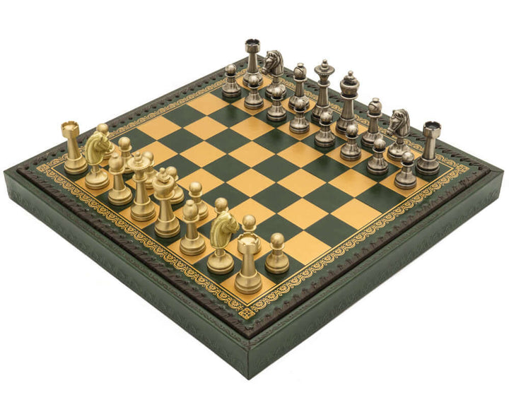 The Turin Verde Italian Chess Set with green and gold leatherette chess board, featuring intricately detailed brass and silver chess pieces.