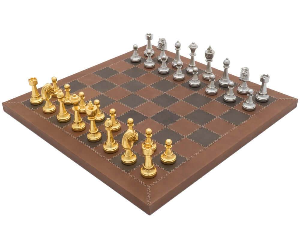 The Messina Gold and Silver Italian Leather Luxury Chess Set with metal chessmen on leather chessboard.