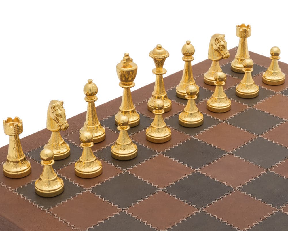 Gold chessmen on luxury Italian leather chess board from The Messina Gold and Silver Chess Set