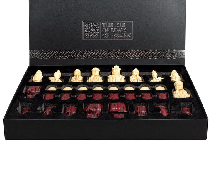 The Isle of Lewis black and red chess set with intricate details and superb packaging.