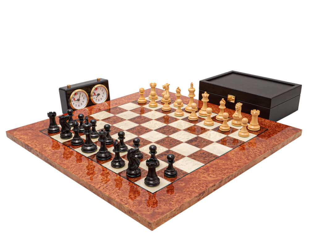 The Highgrove Ebony and Briarwood Luxury Chess Set with ebony and ivory pieces, 20.5 inch briarwood board, and a dual-faced chess clock.