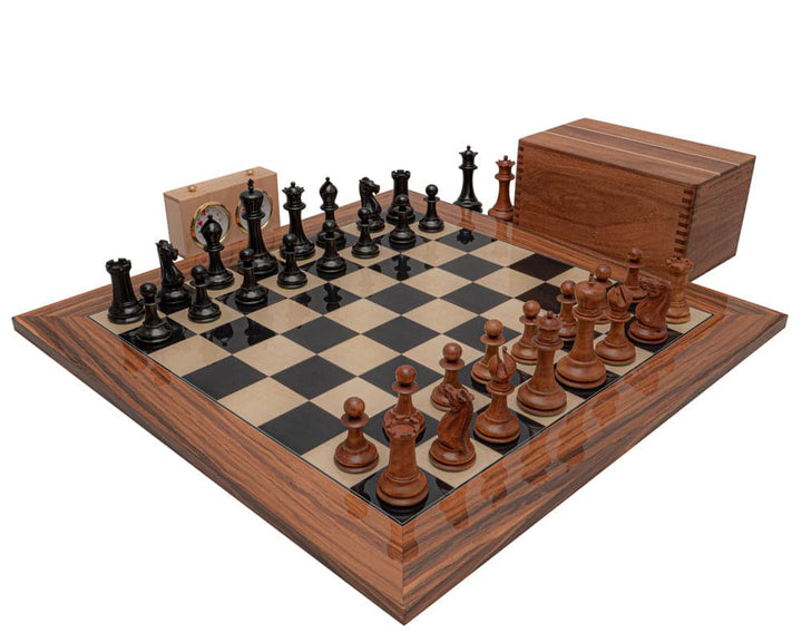 Luxurious 1849 Reproduction Staunton Chess Set featuring ebony and antiqued boxwood pieces on a Spanish board with a wooden box and clock.