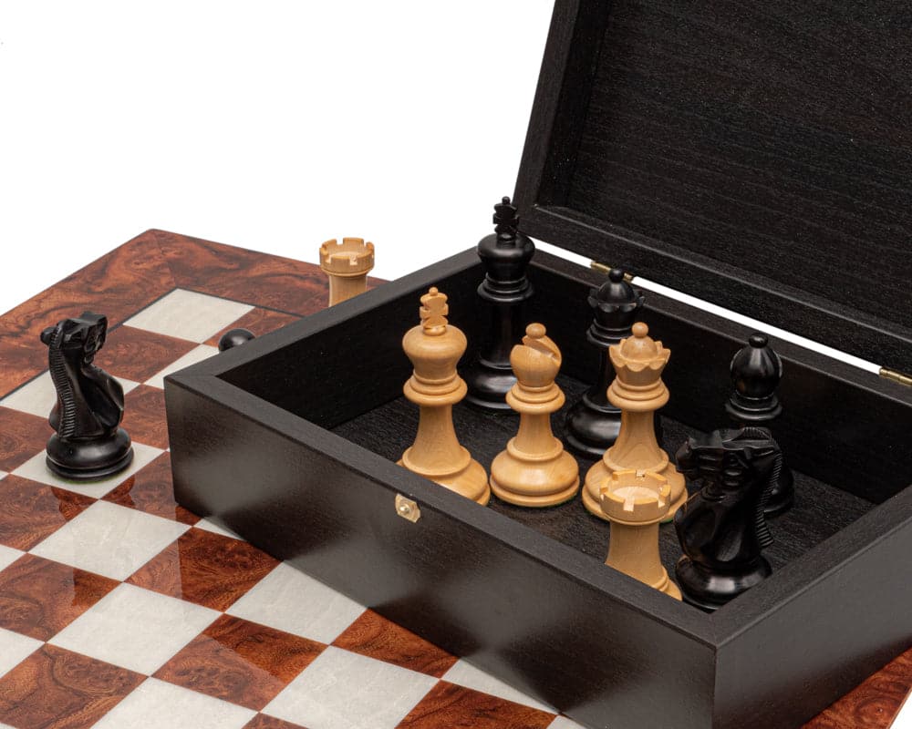 The Highgrove Briarwood and Black Luxury Chess Set with boxwood Staunton pieces on briarwood and elm chessboard with case.