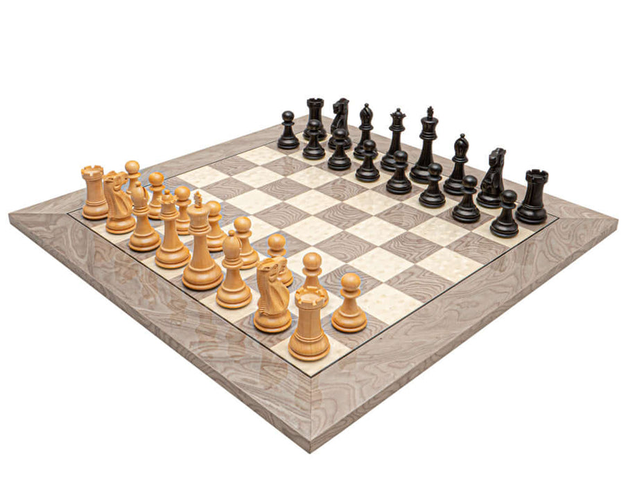 The Victoria Black and Grey Ash Burl Classic Chess Set displayed on a stunning 19.7 inch Spanish board with 1.97 inch grey Ash burl and maple squares.