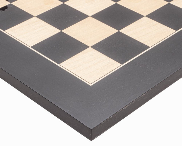 Close-up of the high gloss Black Anegre and Maple chessboard from The Harrwitz Black and Anegre Staunton Chess Set with 1.9 inch playing squares.