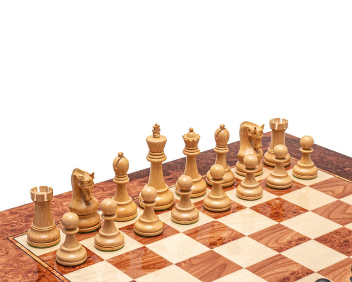 Luxury chess set with elm burl and maple board featuring intricately crafted wooden pieces, displayed in starting position.