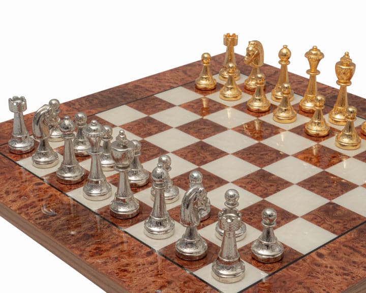 The Messina Gold and Briarwood Luxury Italian Chess Set on elegant briarwood and elm board with gold and silver plated pieces.