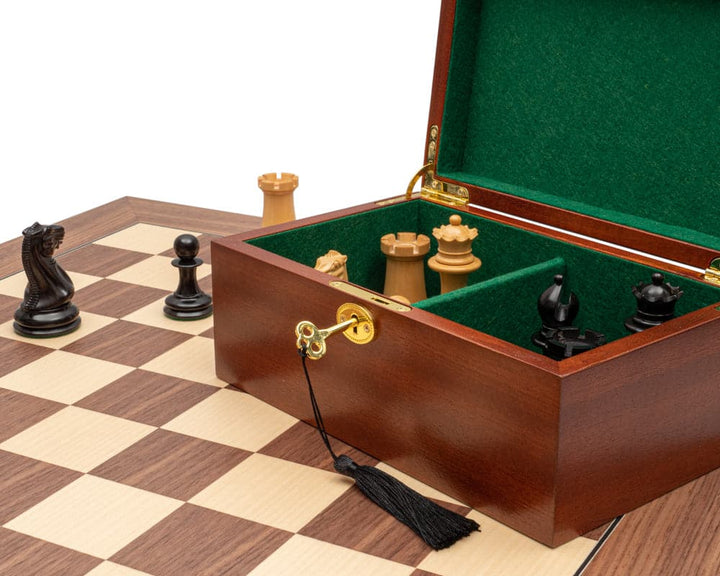 Luxury Staunton chess set with ebony and walnut pieces, mahogany cabinet, and 23.6-inch board with 2.36-inch squares.