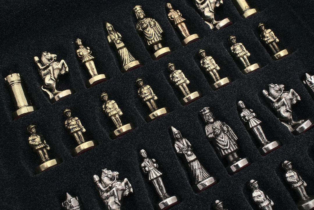 Metal chess pieces from the Manopoulos Byzantine Empire Chess Set in wooden case, compact edition, displayed on a black background